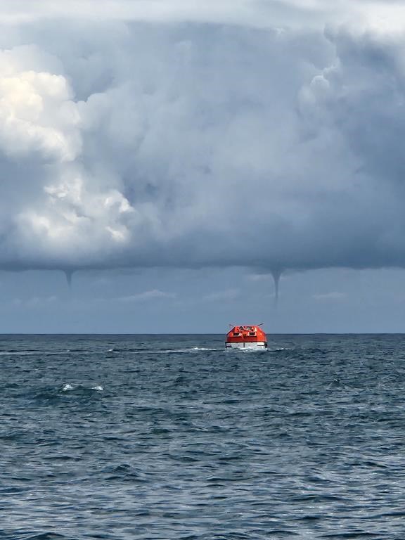 Marc-André Bourgeois-Gaudet was in his boat off the shores of Îles-de-la-Madeleine, Que., last Friday when he saw several funnel clouds descending from the sky like tornadoes.