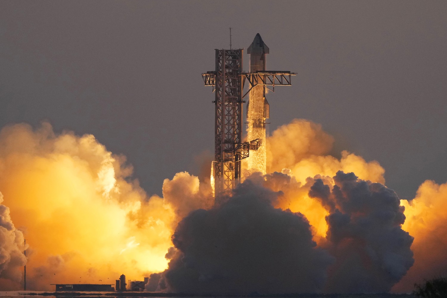 SpaceX launched its fifth test flight of its Starship rocket on Sunday and made a dramatic first catch of the rocket’s more than 20-story tall booster.