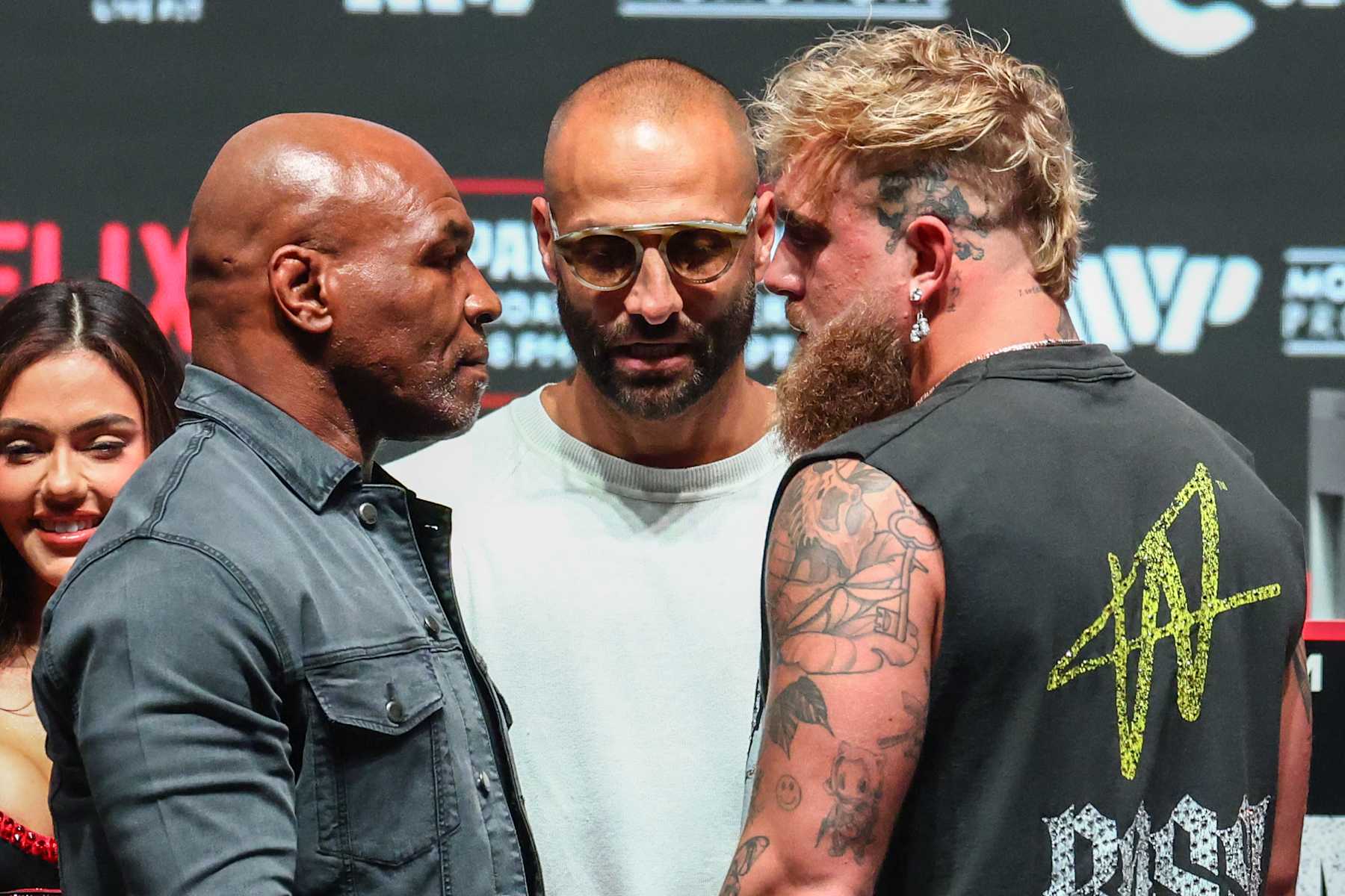 Things are heating up ahead of Mike Tyson's fight with Jake Paul on Friday. As the two boxers stared each other down at their weight-in on Thursday, Tyson…